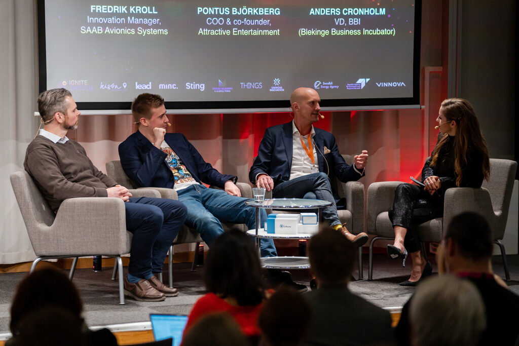 Blekinge Business Incubator CEO Anders Cronholm presenting the startup–corporate collaboration between Swedish multinational Saab and gaming startup Attractive Interaction at Ignite Sweden Summit 2019.